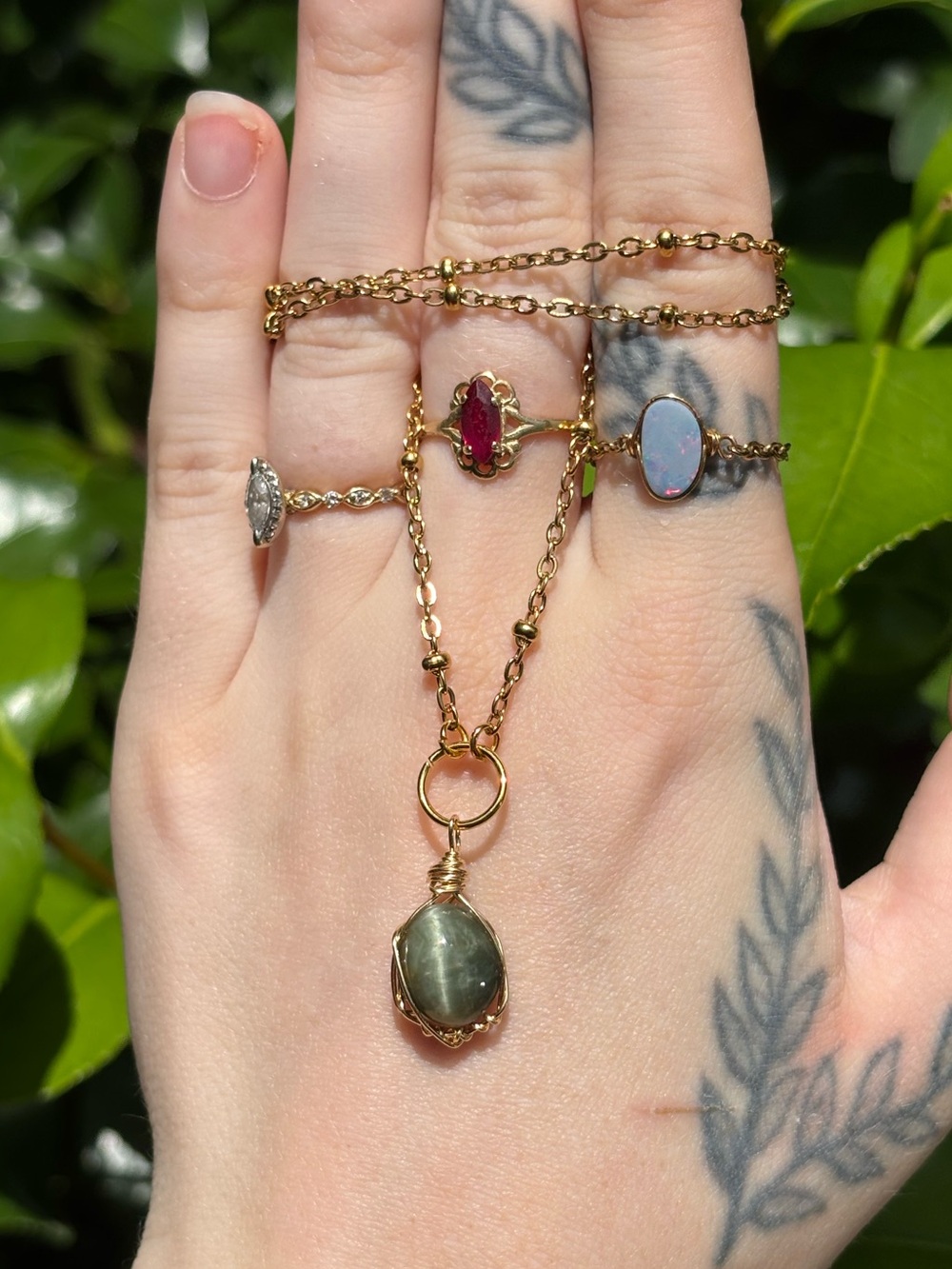 Green catseye charm necklace